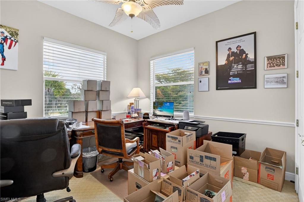 1964 Rialto Way Alva, FL 33920 - Photo 26 of 50 a view of a workspace with furniture and a window