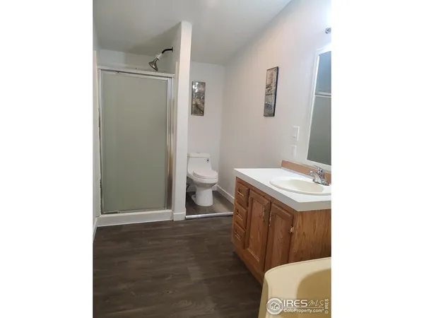 a view of a livingroom with shelves