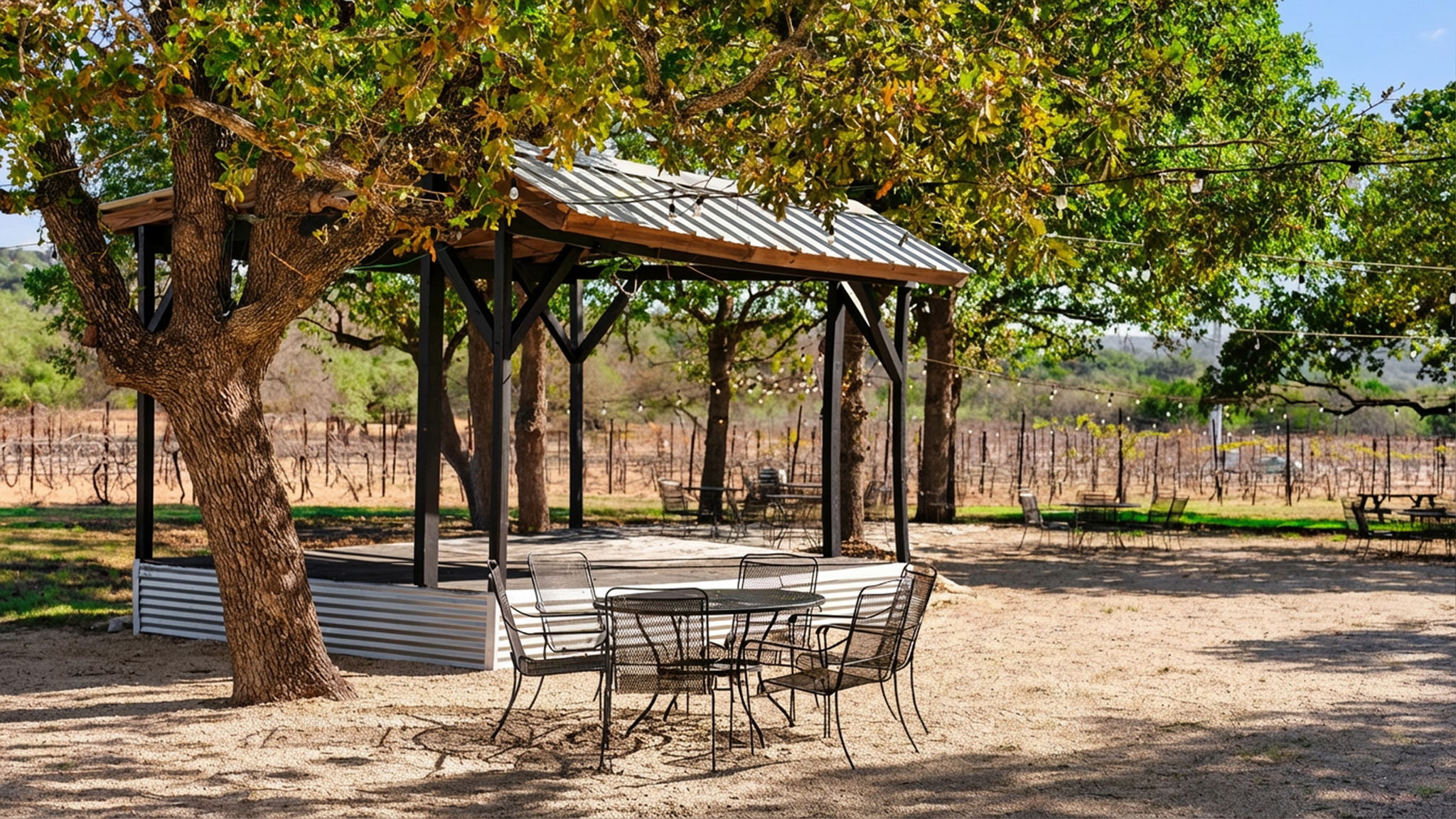 25711 Hamilton Pool Road Round Mountain, TX 78663 - Photo 16 of 39 a view of outdoor space with seating