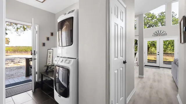 a kitchen with stainless steel appliances a refrigerator a stove a microwave and cabinets