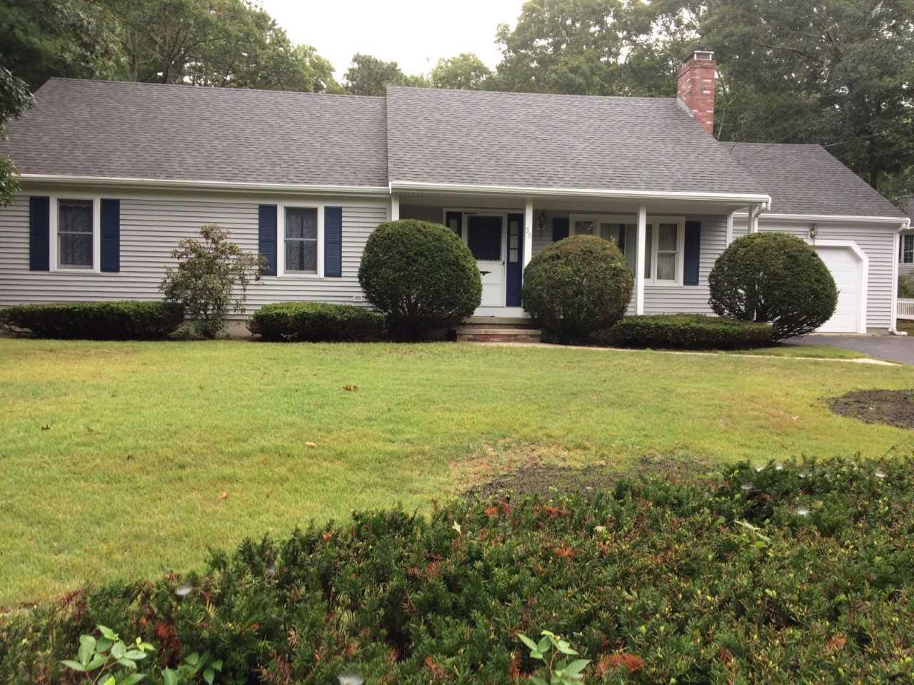 30 Lumbert Mill Road Centerville, MA 02632 - Photo 1 of 19 a view of a house with a garden and plants