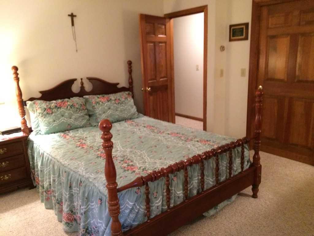 30 Lumbert Mill Road Centerville, MA 02632 - Photo 14 of 19 a bedroom with a bed and wooden floor