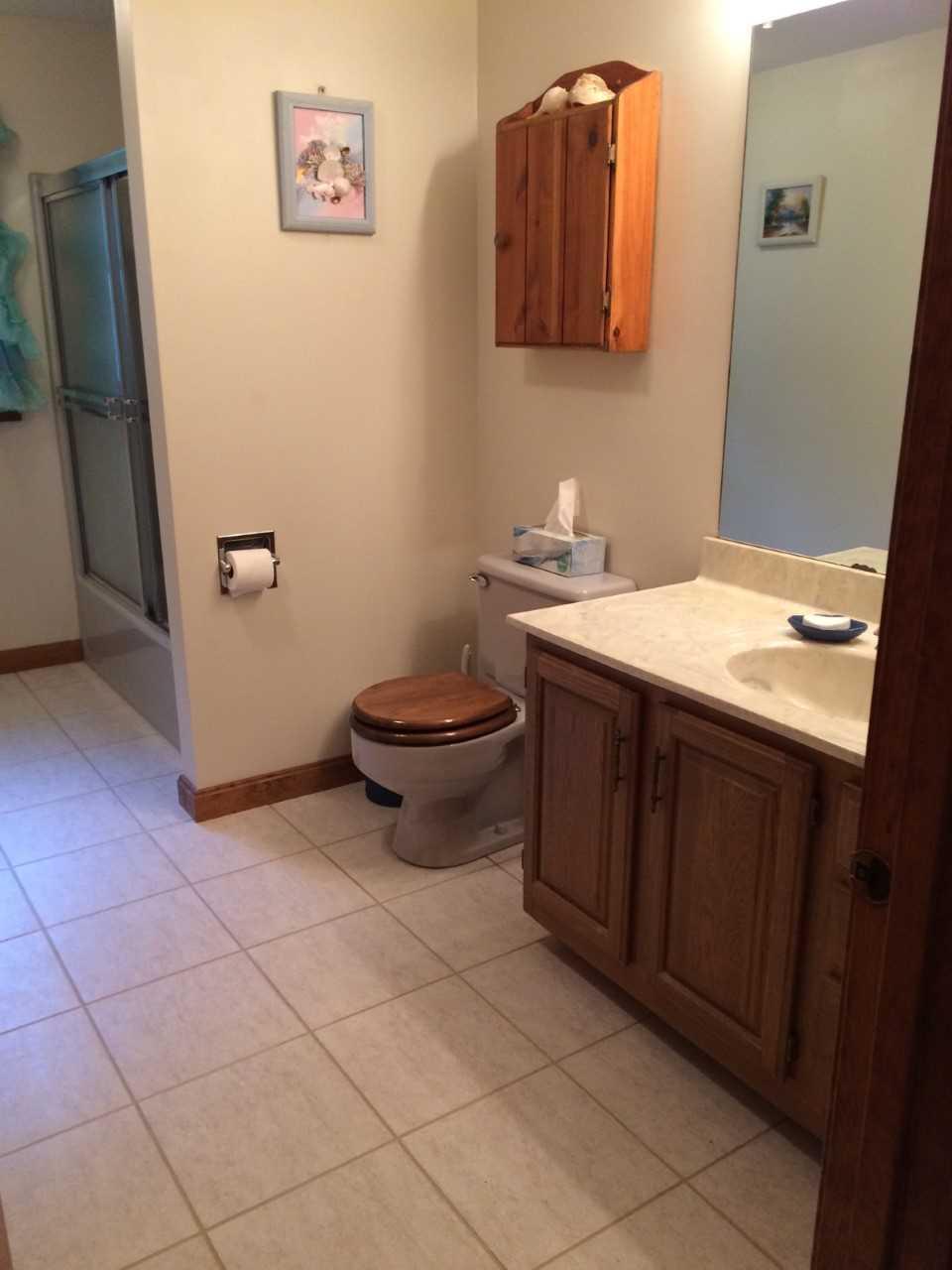 30 Lumbert Mill Road Centerville, MA 02632 - Photo 18 of 19 a bathroom with a sink and a mirror