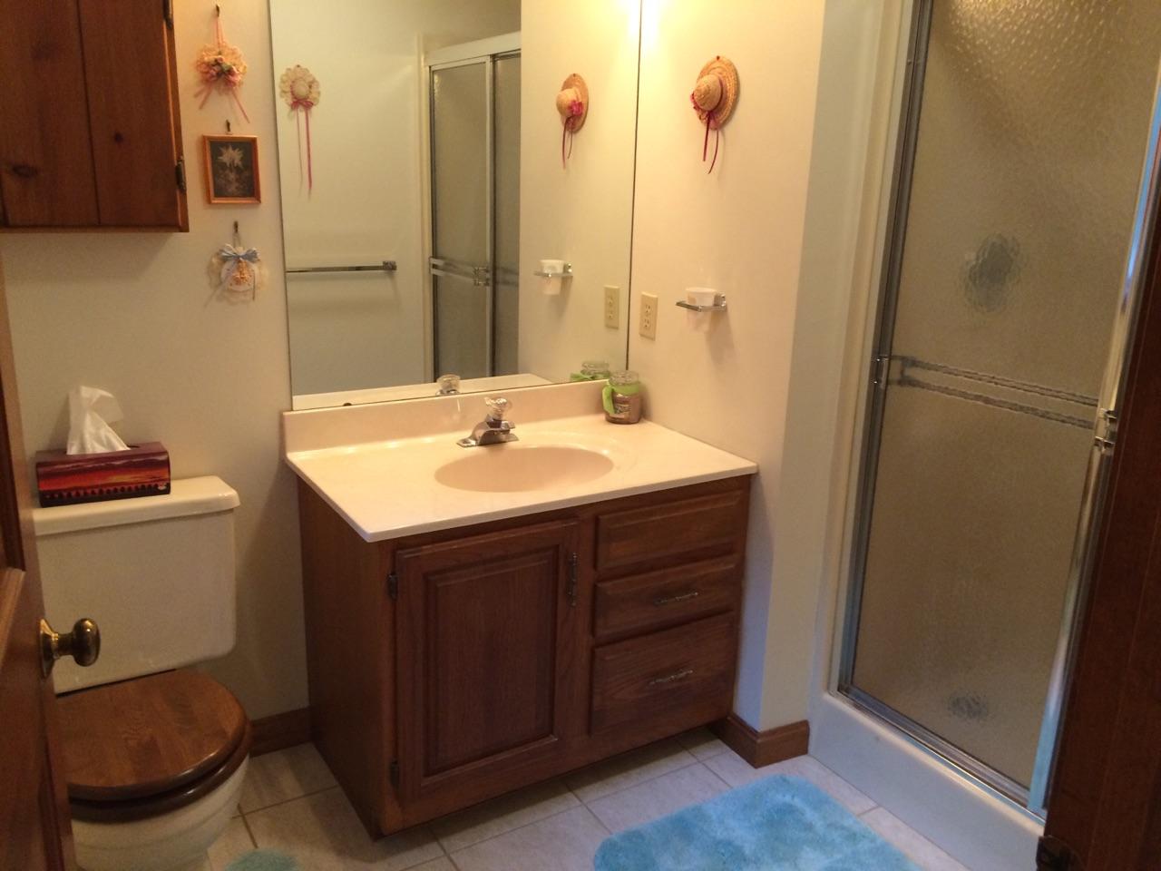 30 Lumbert Mill Road Centerville, MA 02632 - Photo 19 of 19 a bathroom with a sink and a mirror