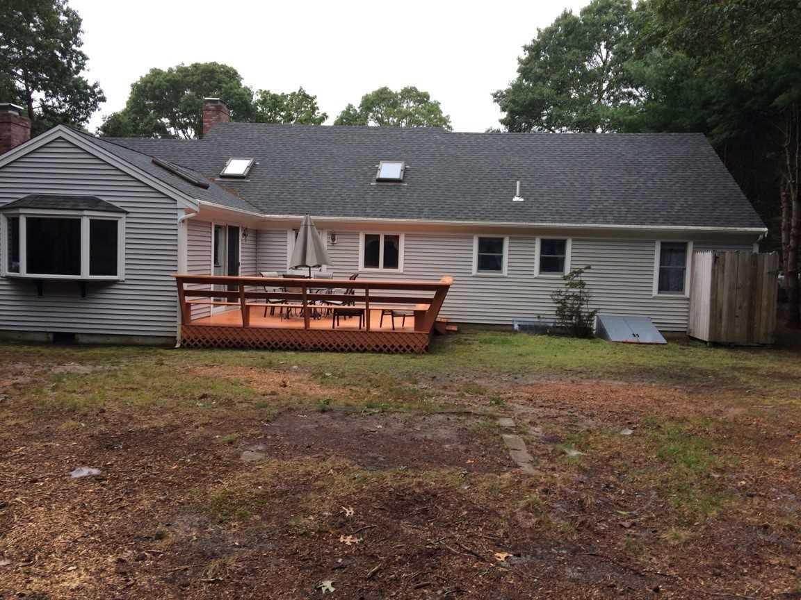 30 Lumbert Mill Road Centerville, MA 02632 - Photo 2 of 19 a house view with a garden space