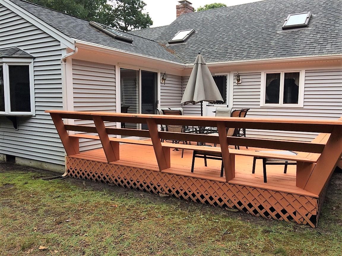 30 Lumbert Mill Road Centerville, MA 02632 - Photo 3 of 19 a backyard of a house with large trees