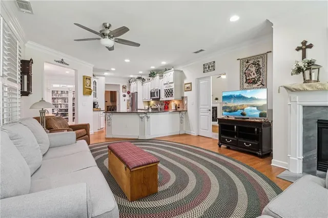 a kitchen with granite countertop a refrigerator and a stove