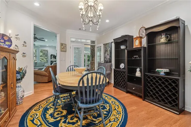 a kitchen with stainless steel appliances kitchen island granite countertop a stove top oven and granite counter tops