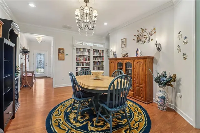 a living room with furniture and a piano