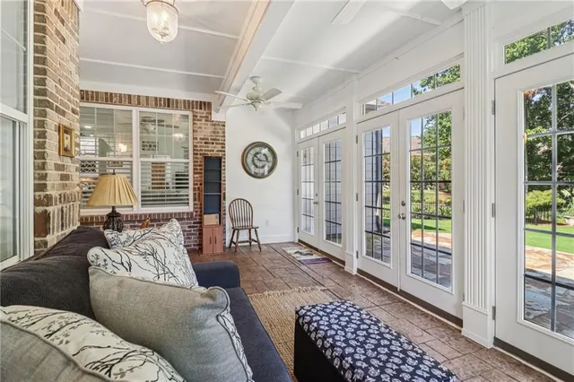 a spacious bathroom with a shower sink and mirror
