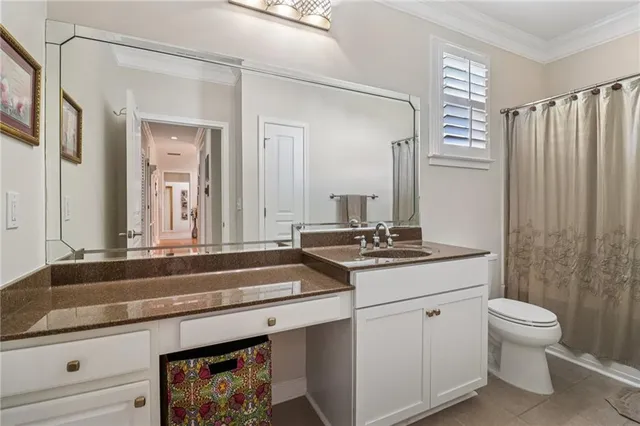 a view of swimming pool with a yard in front of it