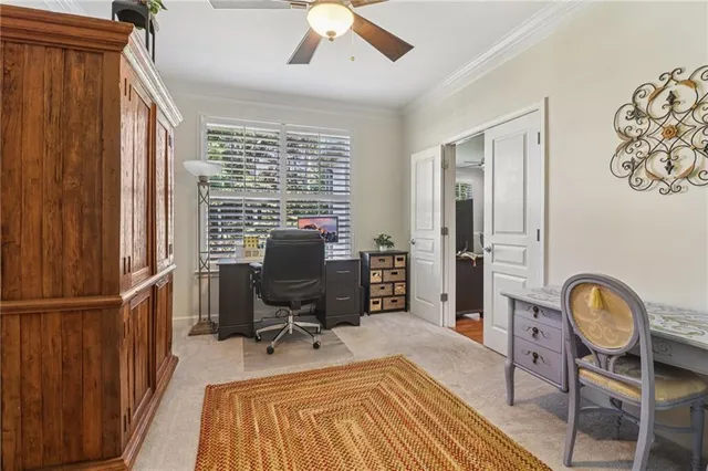 an aerial view of a house with a garden and plants