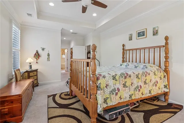 a front view of a house with a yard table and chairs