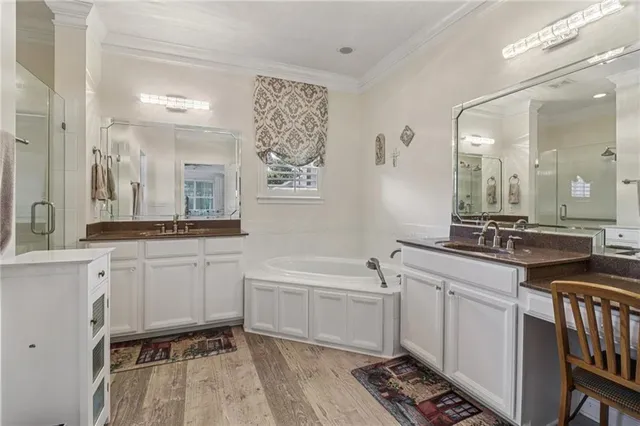 a front view of a house with a yard table and chairs