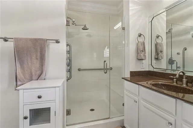 a living room with furniture a chandelier and a dining room