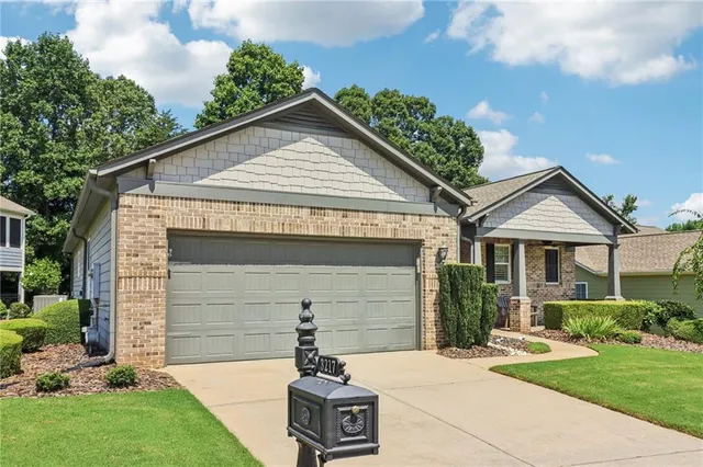a living room with furniture flat screen tv and a fireplace