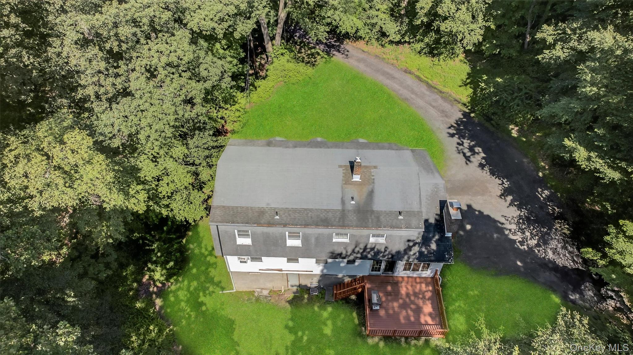 300 Estrada Road Central Valley, NY 10917 - Photo 12 of 30 an aerial view of residential house with outdoor space and trees all around