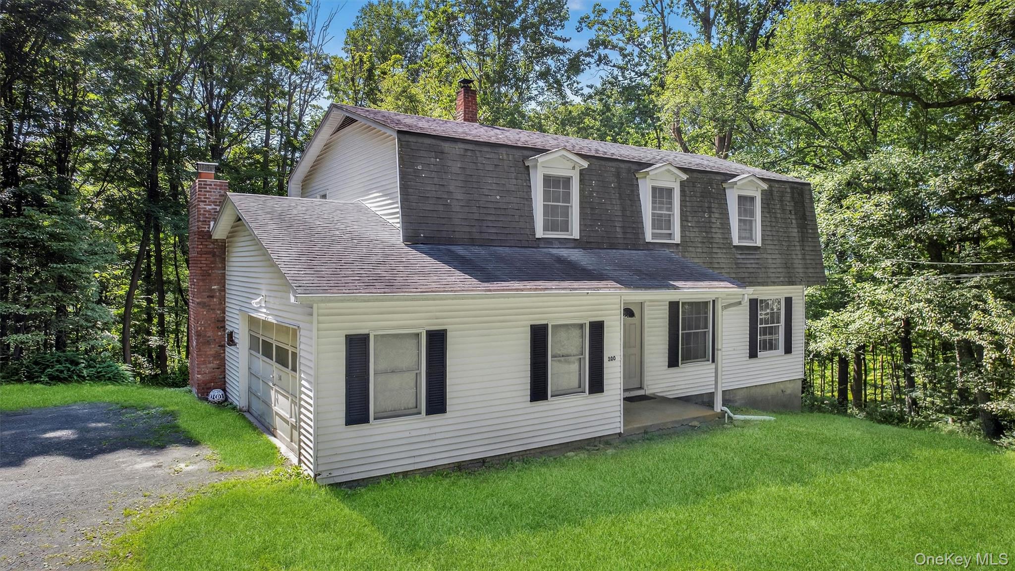 300 Estrada Road Central Valley, NY 10917 - Photo 18 of 30 a view of a house with a yard