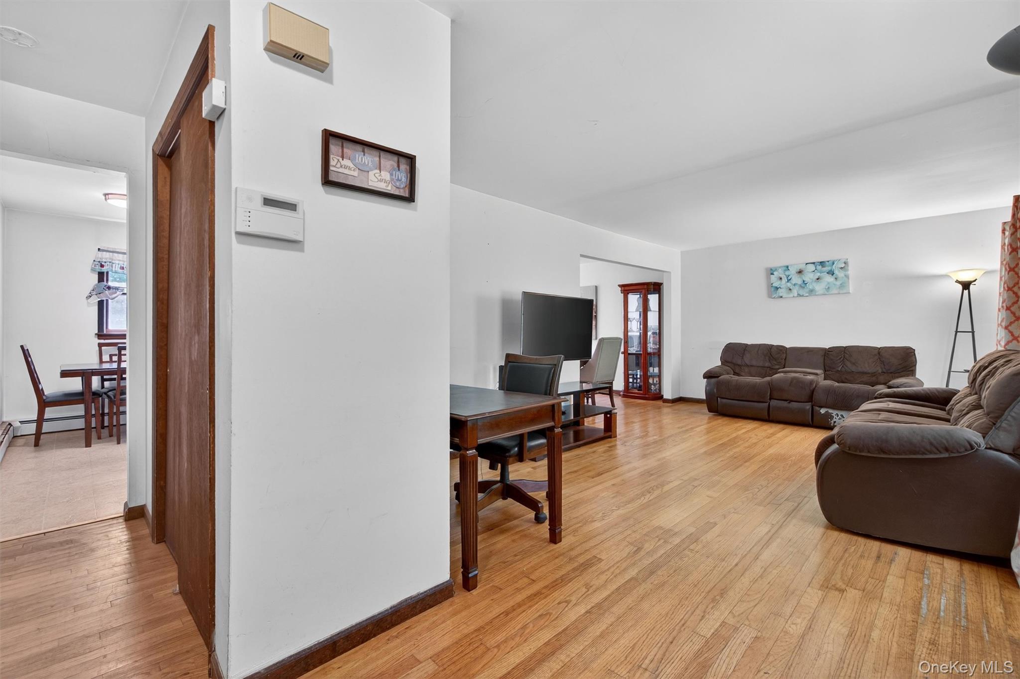 300 Estrada Road Central Valley, NY 10917 - Photo 20 of 30 a living room with furniture and a flat screen tv