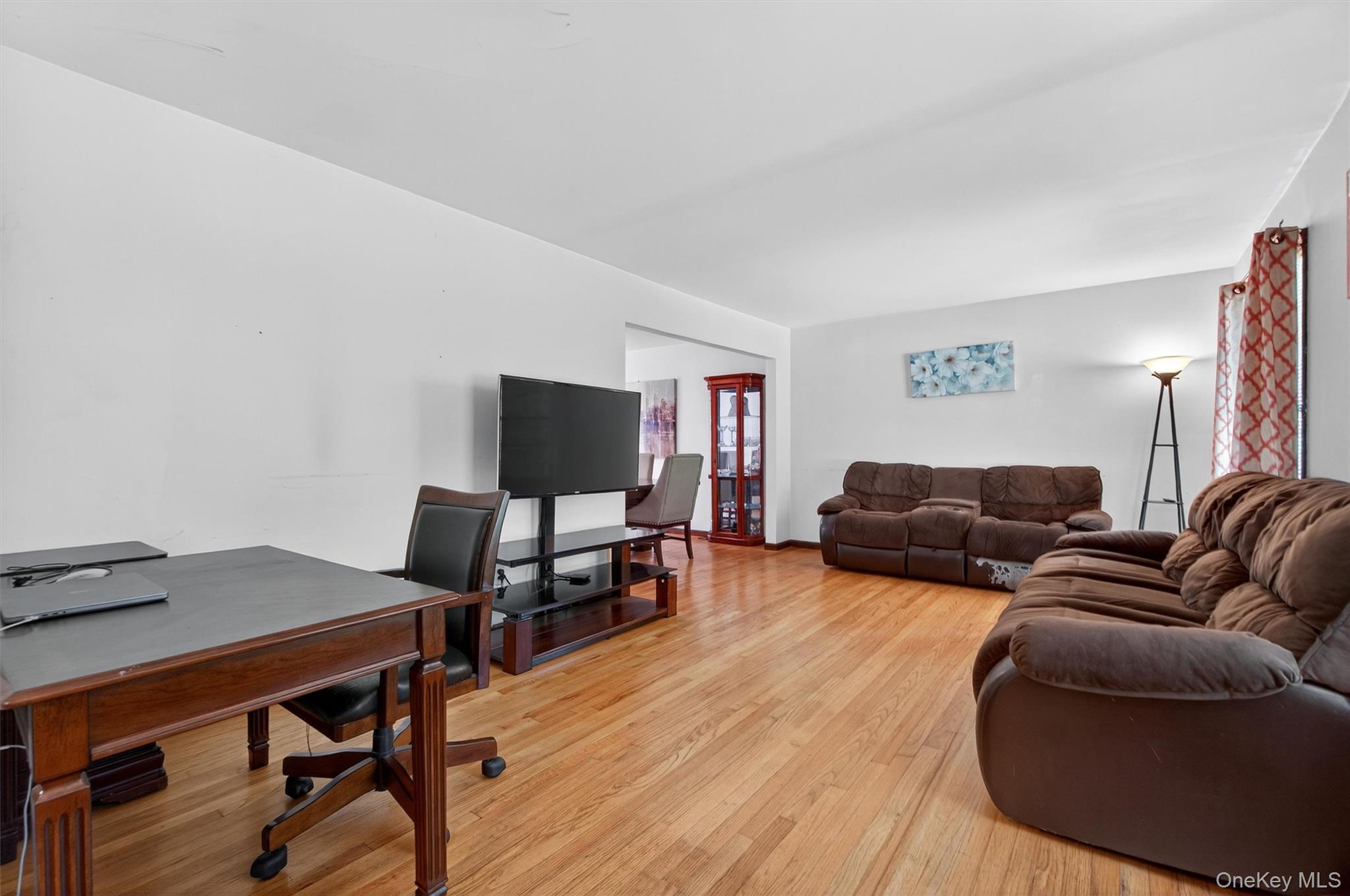 300 Estrada Road Central Valley, NY 10917 - Photo 21 of 30 a living room with furniture and a flat screen tv