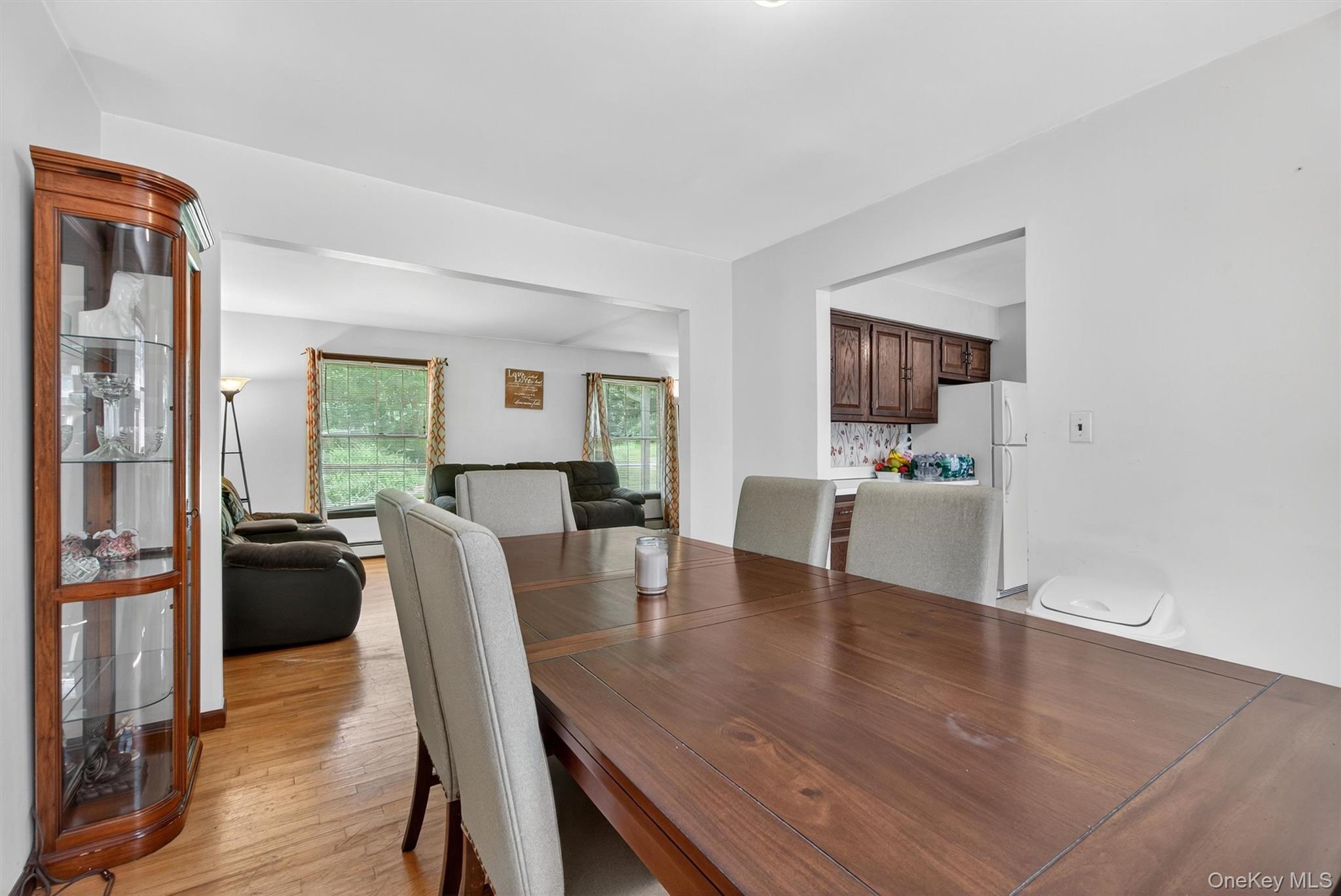 300 Estrada Road Central Valley, NY 10917 - Photo 27 of 30 a view of a dining room with furniture and wooden floor
