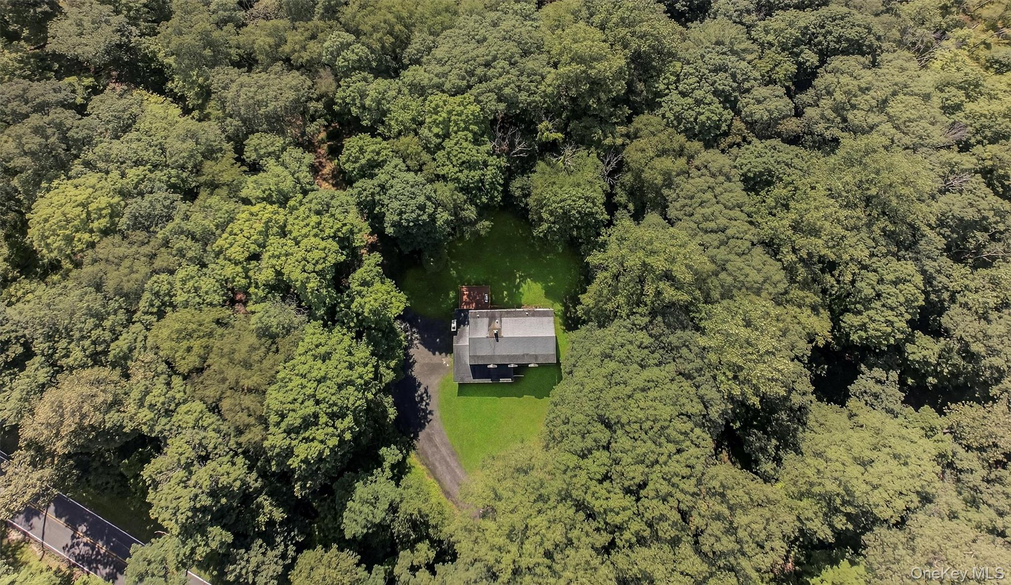 300 Estrada Road Central Valley, NY 10917 - Photo 4 of 30 a aerial view of a house with a yard
