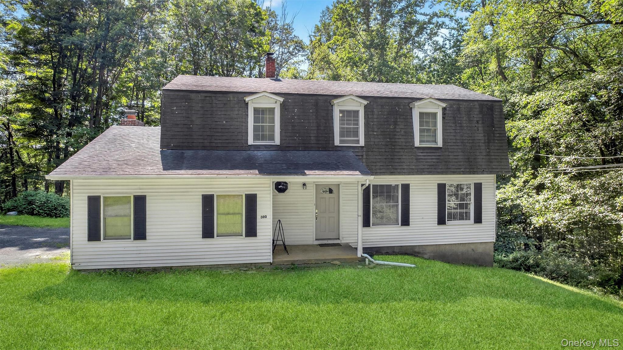 300 Estrada Road Central Valley, NY 10917 - Photo 6 of 30 a view of a house with a yard