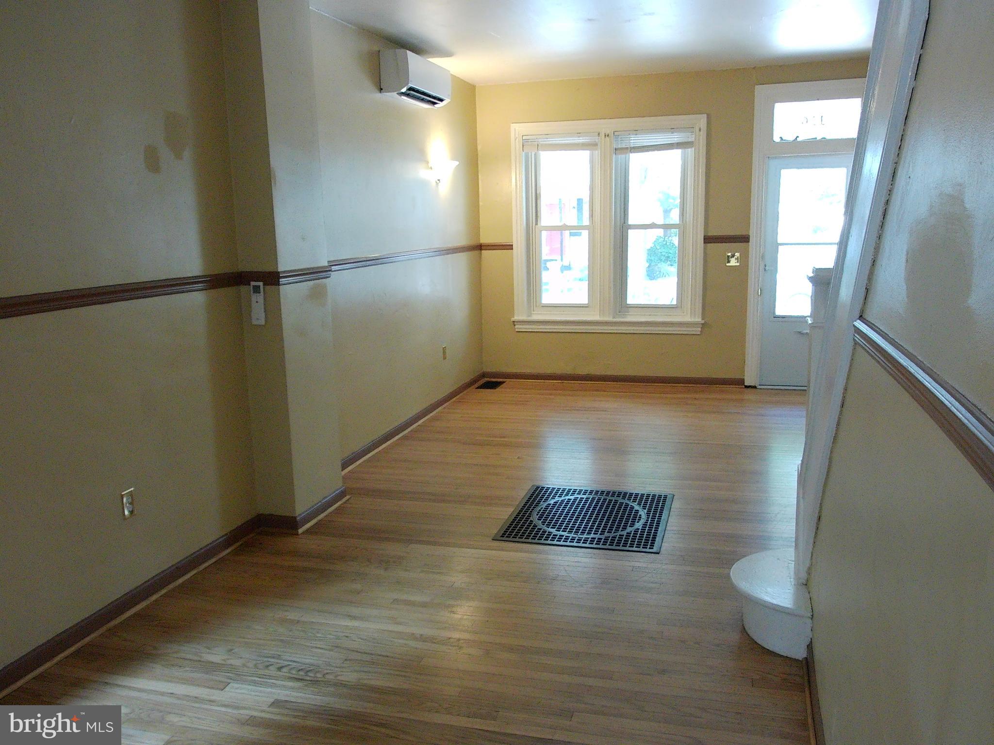 1116 Queen Street Pottstown, PA 19464 - Photo 13 of 48 a view of livingroom with hardwood floor and window