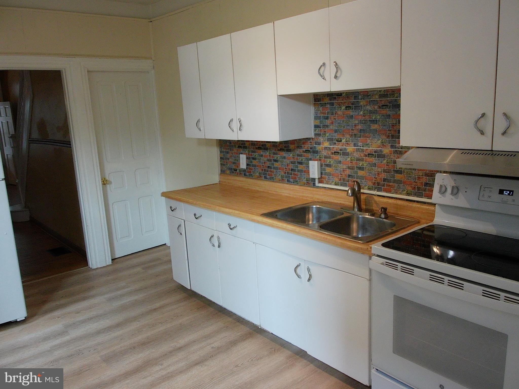 1116 Queen Street Pottstown, PA 19464 - Photo 20 of 48 a kitchen with a sink and cabinets