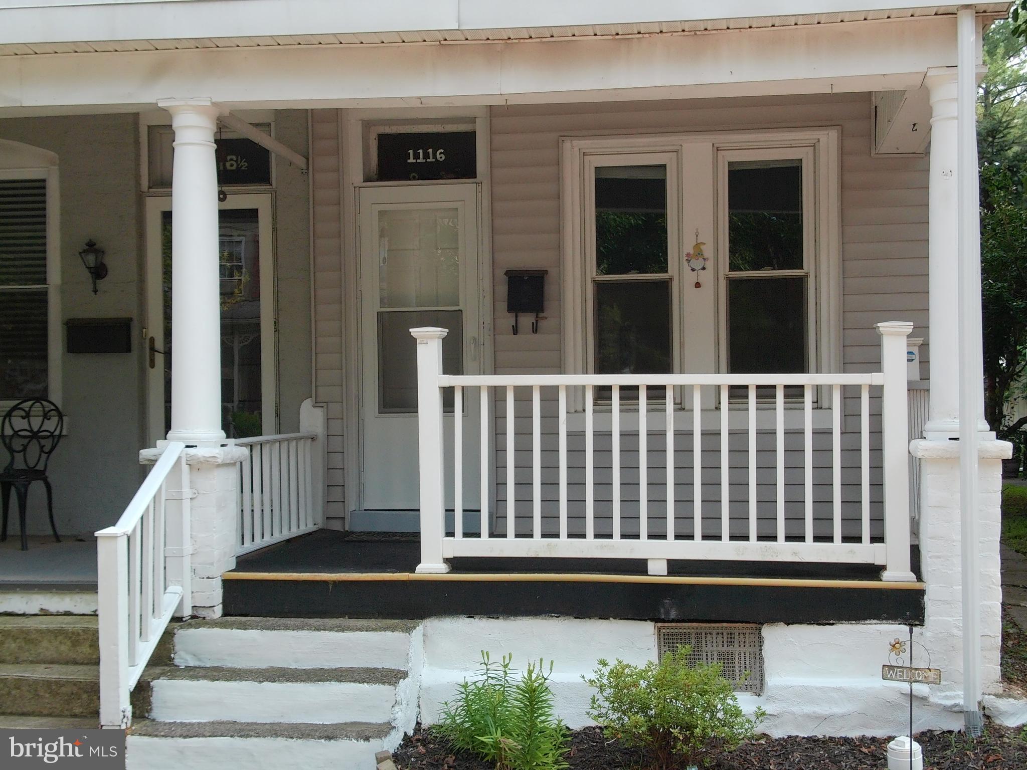 1116 Queen Street Pottstown, PA 19464 - Photo 2 of 48 a view of a house with a small deck