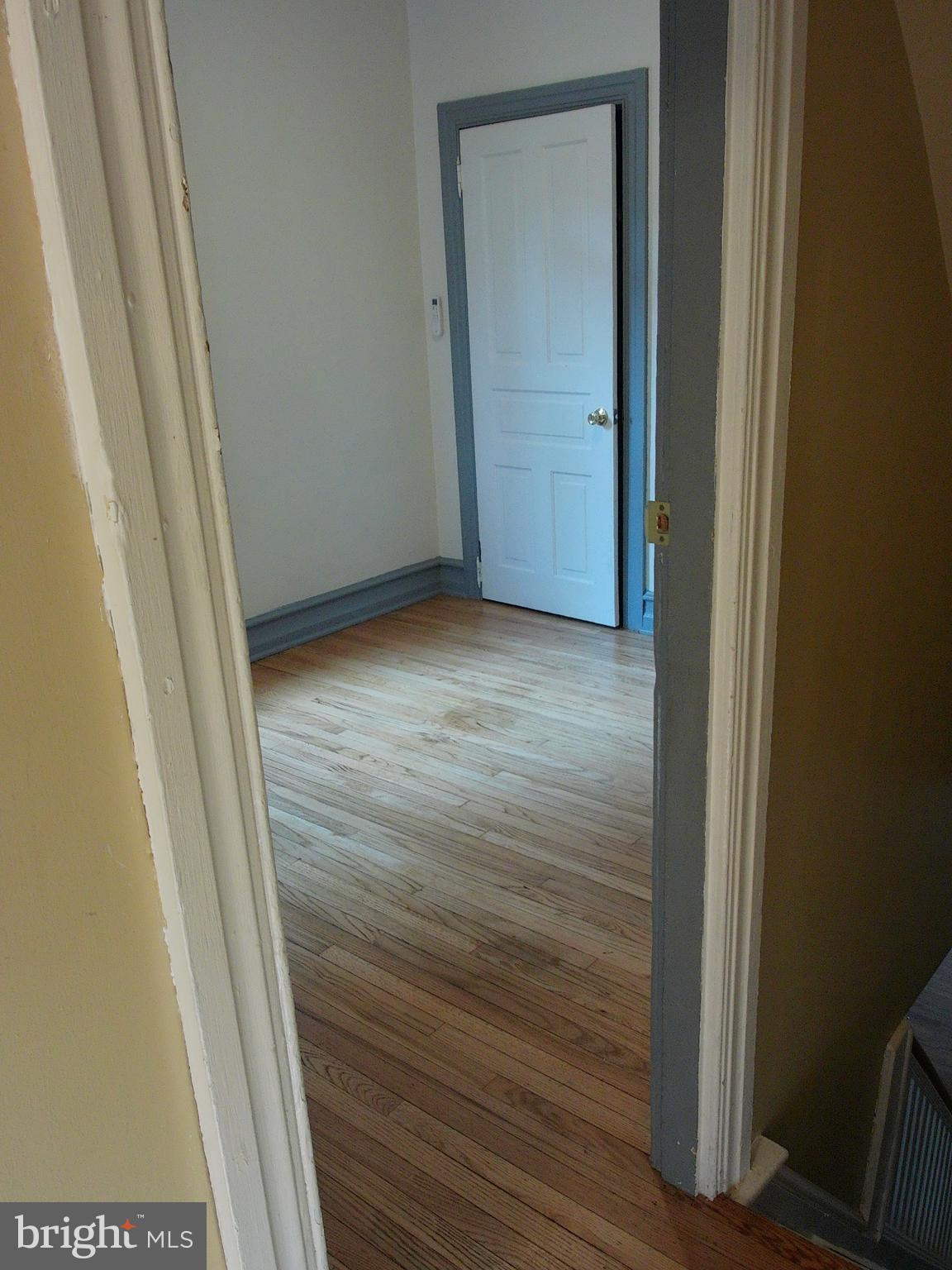 1116 Queen Street Pottstown, PA 19464 - Photo 30 of 48 a view of hallway with wooden floor