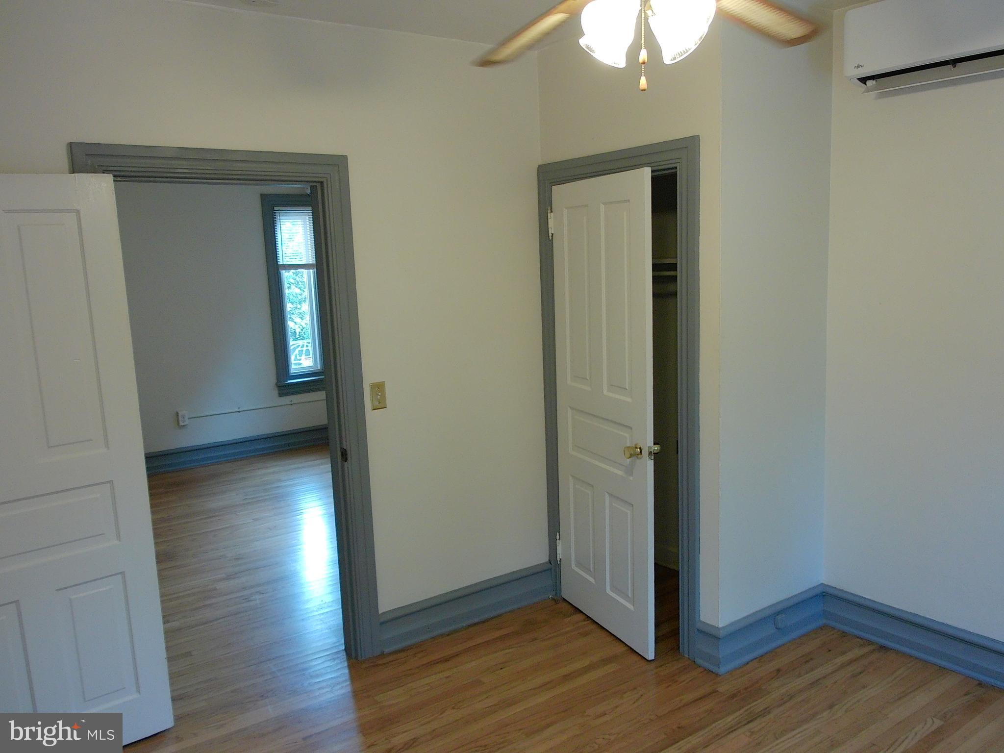 1116 Queen Street Pottstown, PA 19464 - Photo 38 of 48 a view of a hallway with wooden floor
