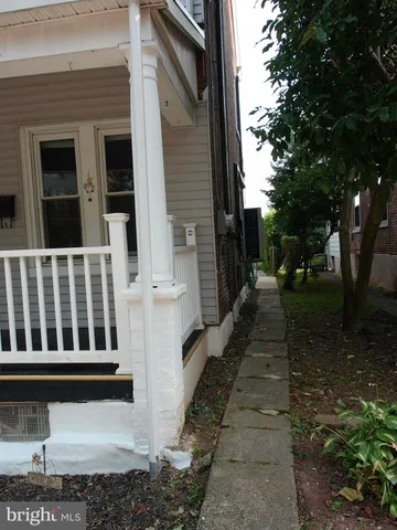 a backyard of a house with seating space