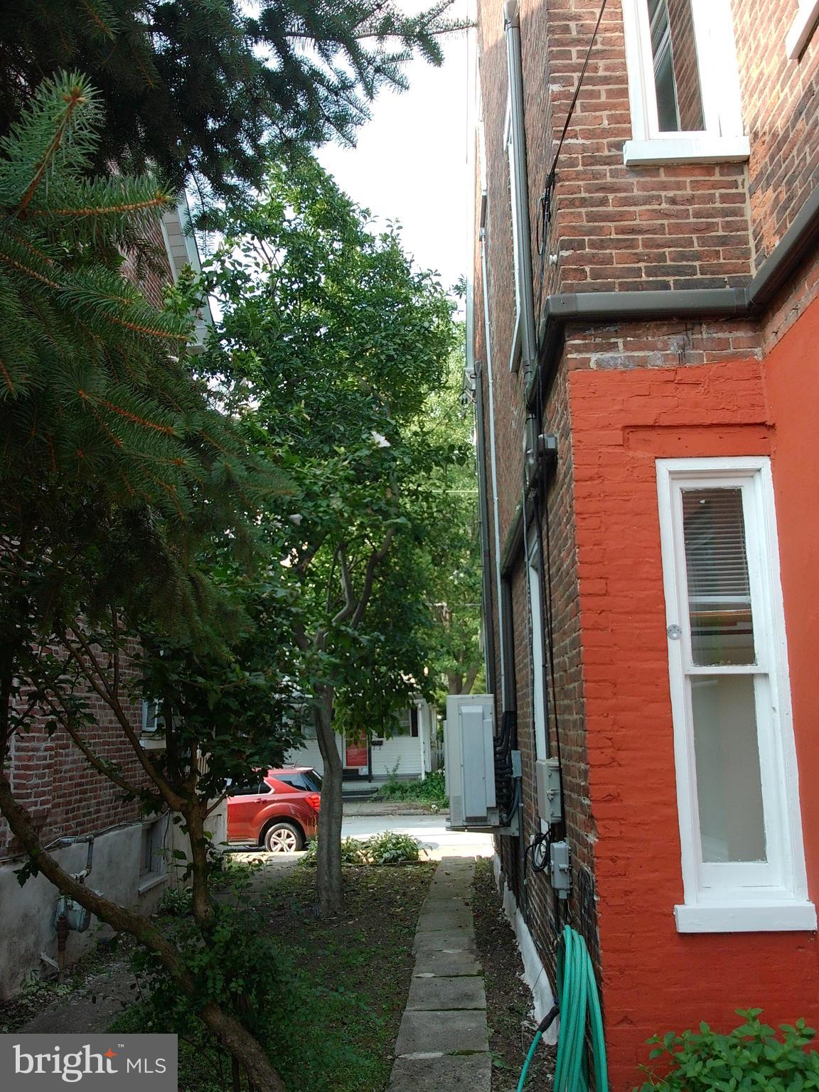 1116 Queen Street Pottstown, PA 19464 - Photo 5 of 48 a backyard of a house with seating space