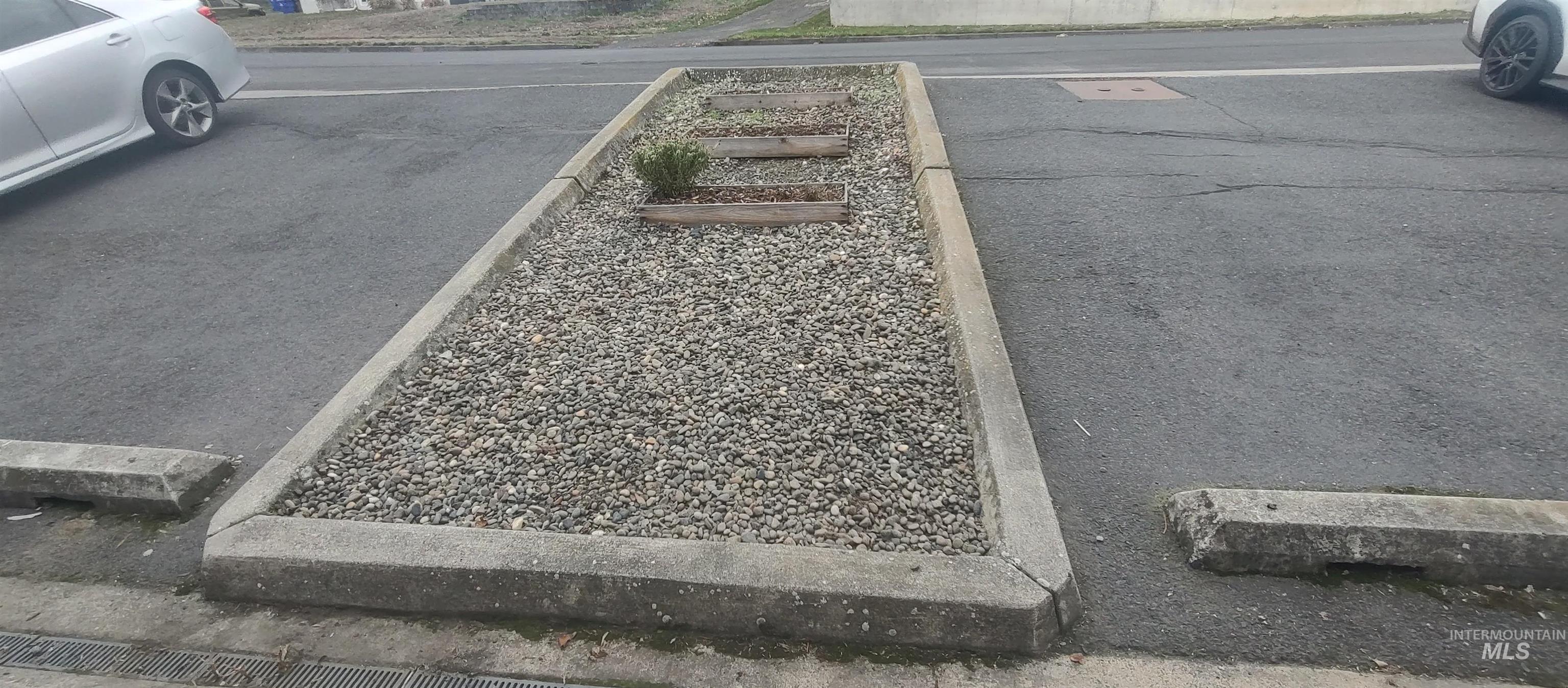 607 Park Street Lewiston, ID 83501 - Photo 3 of 40 Two parking spaces in front of condo. One left and one right of the center landscaped area.