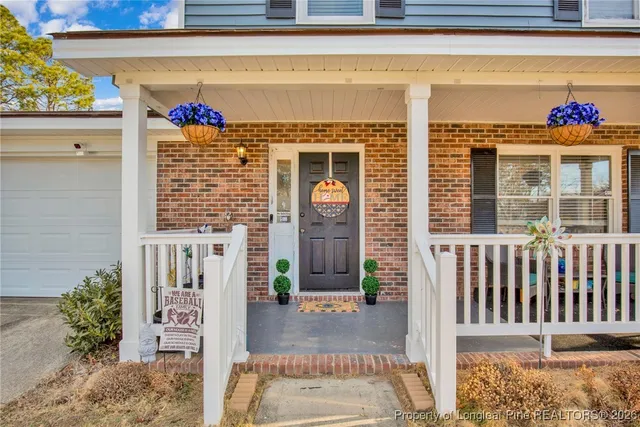 a front view of a house with a porch