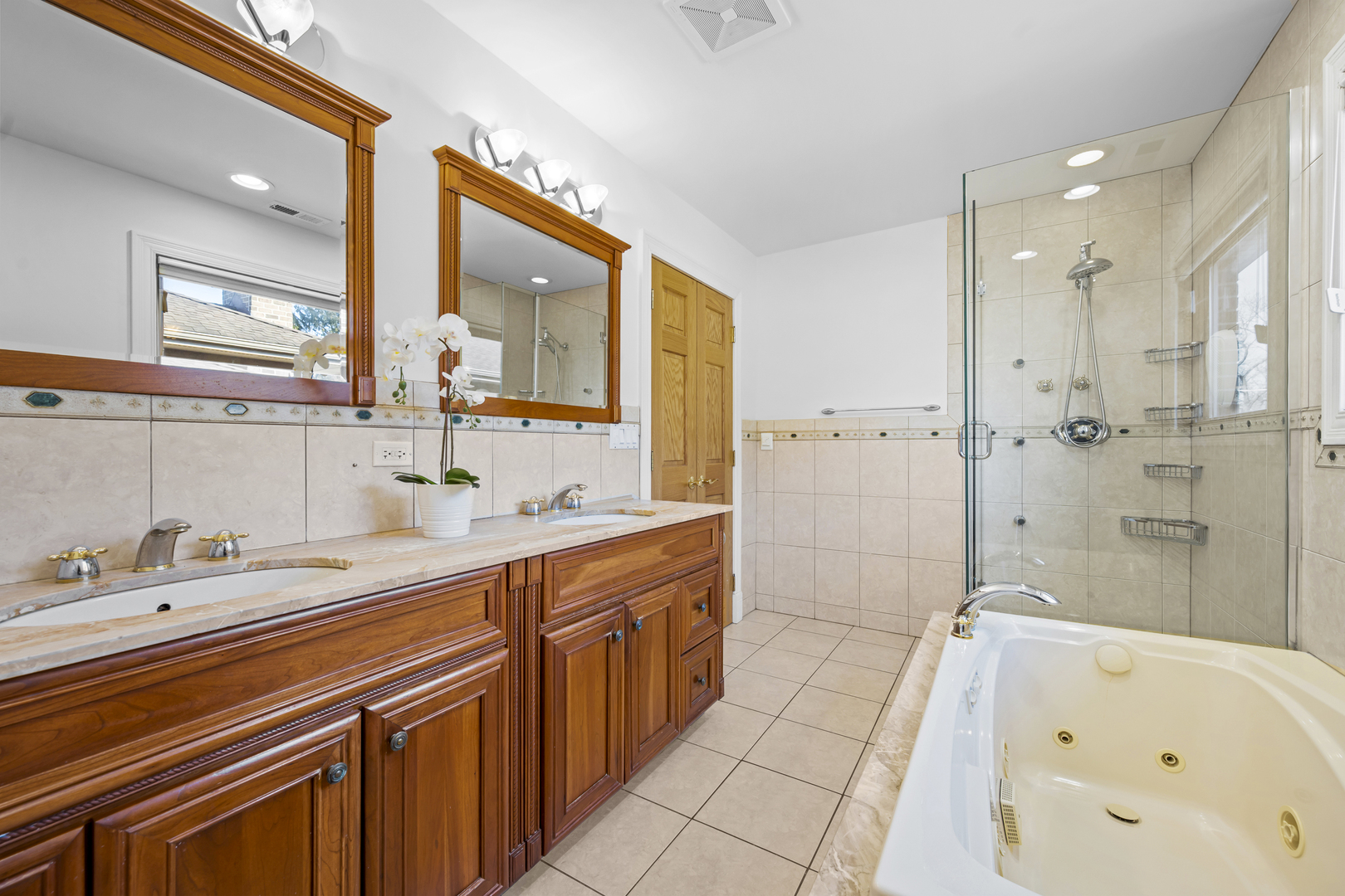 516 Drexel Avenue Glencoe, IL 60022 - Photo 15 of 32 a spacious bathroom with a double vanity sink mirror and shower