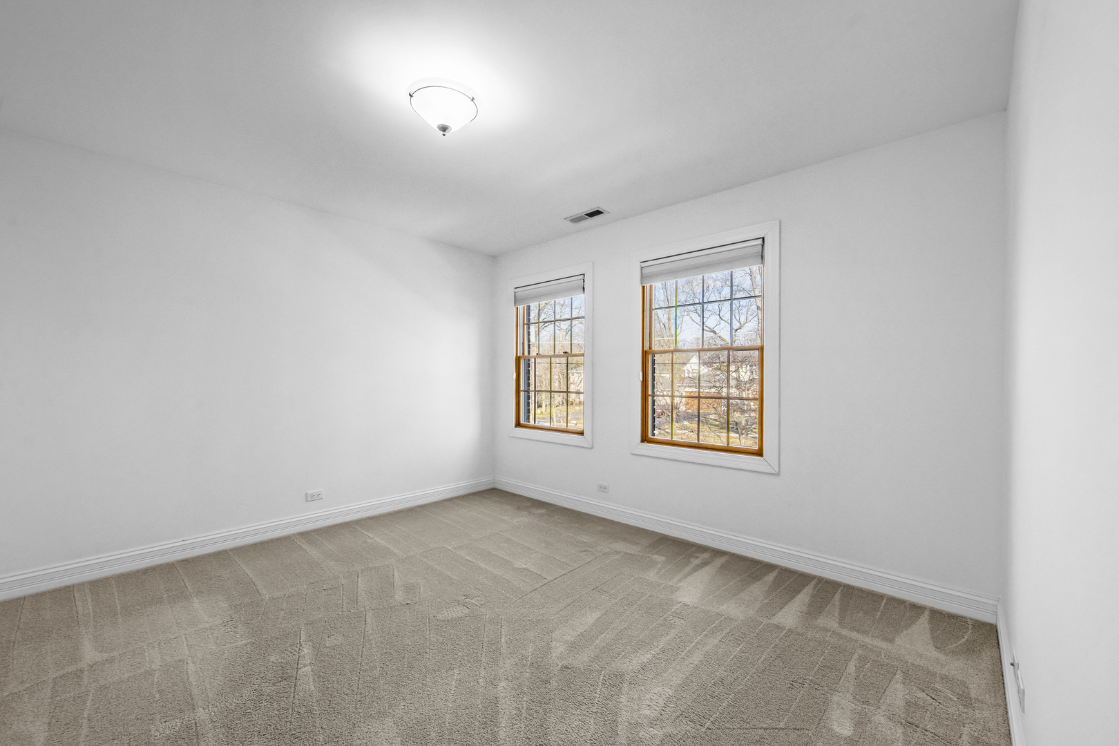 516 Drexel Avenue Glencoe, IL 60022 - Photo 20 of 32 an empty room with a window