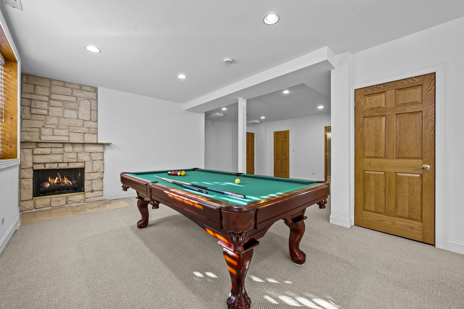 516 Drexel Avenue Glencoe, IL 60022 - Photo 22 of 32 a room with pool table and windows