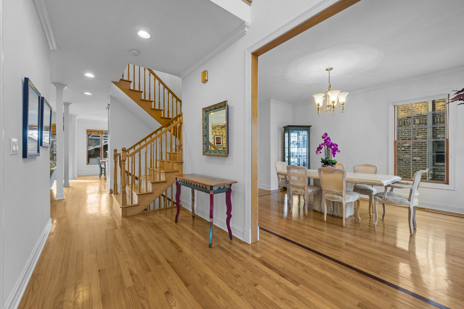 516 Drexel Avenue Glencoe, IL 60022 - Photo 3 of 32 a view of a dining room with furniture and wooden floor