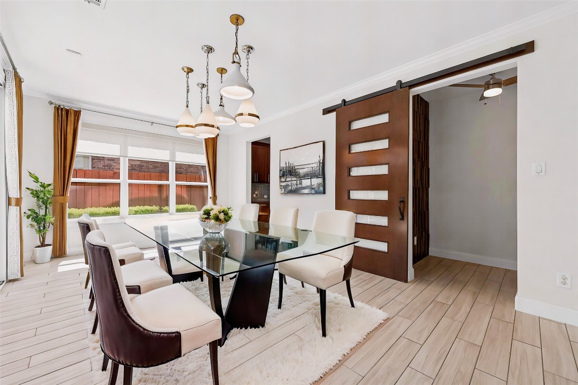 51 Scepter Ridge Sugar Land, TX 77498 - Photo 12 of 46 a view of a dining room with furniture window and wooden floor