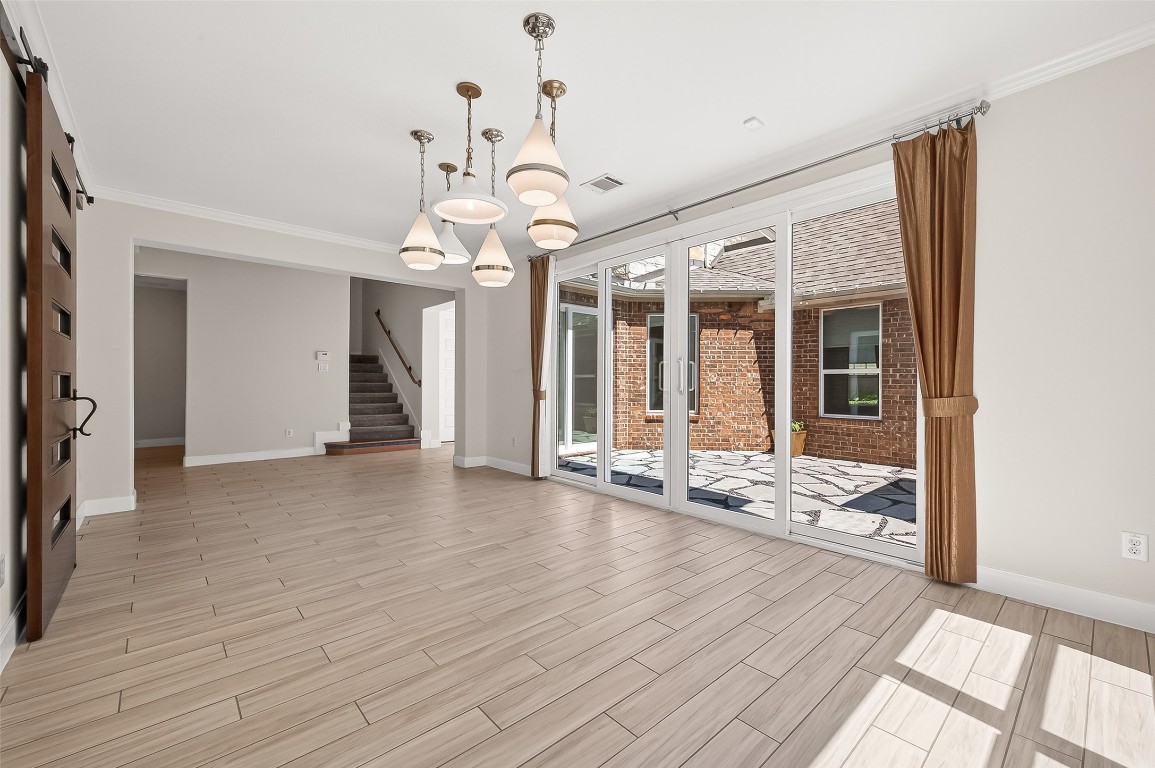 51 Scepter Ridge Sugar Land, TX 77498 - Photo 14 of 46 a view of a livingroom with wooden floor and door