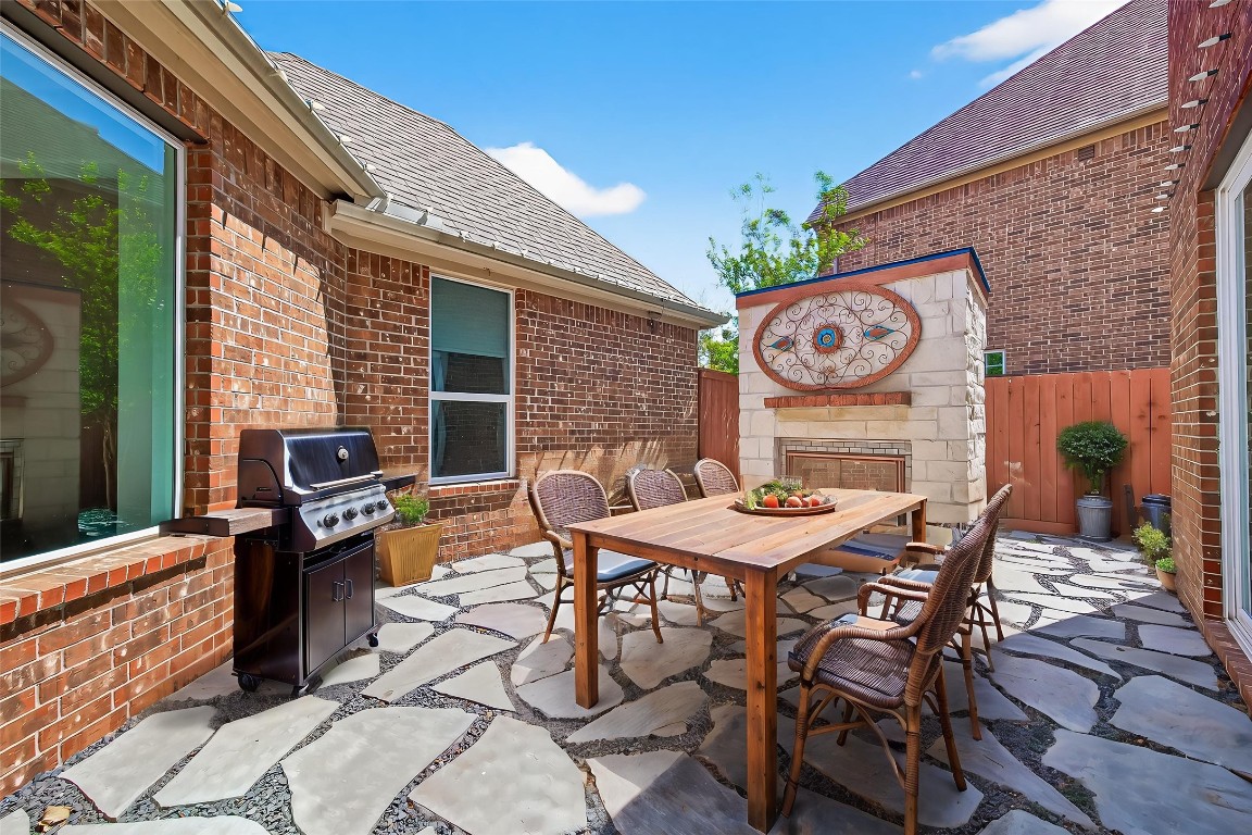 51 Scepter Ridge Sugar Land, TX 77498 - Photo 16 of 46 a dining room with a table and chairs