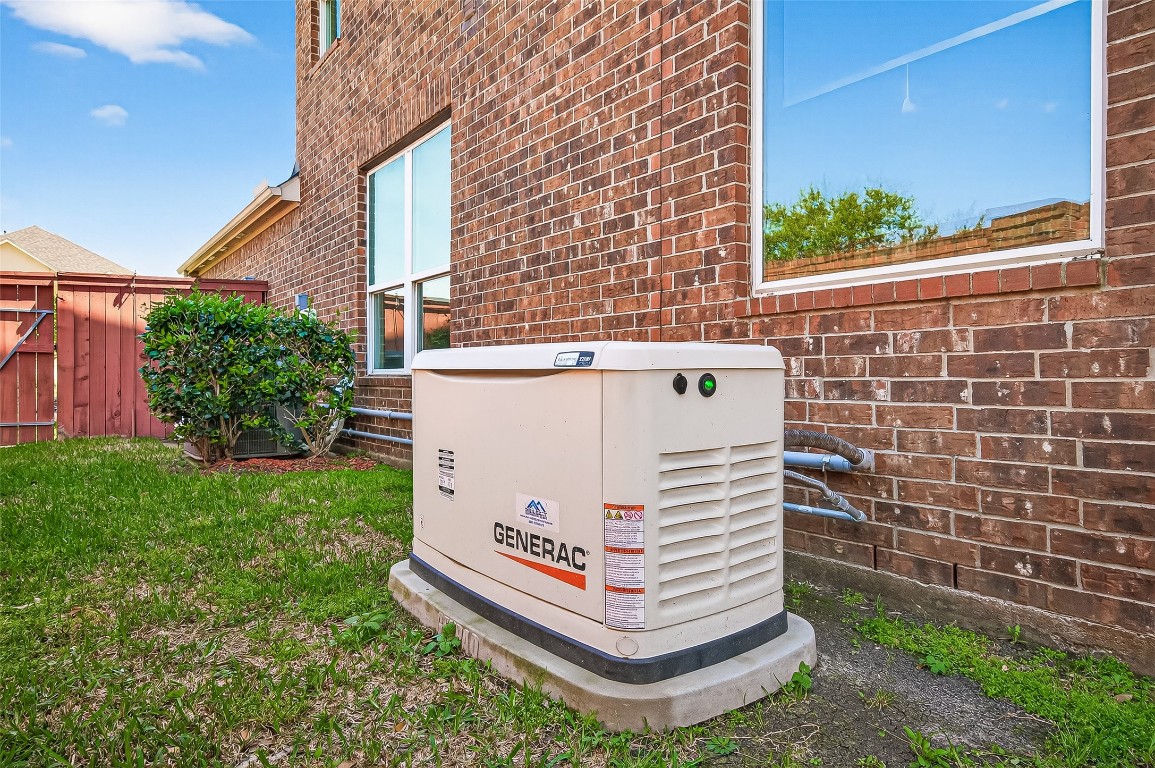 51 Scepter Ridge Sugar Land, TX 77498 - Photo 2 of 46 a white house with a white roof and a yard