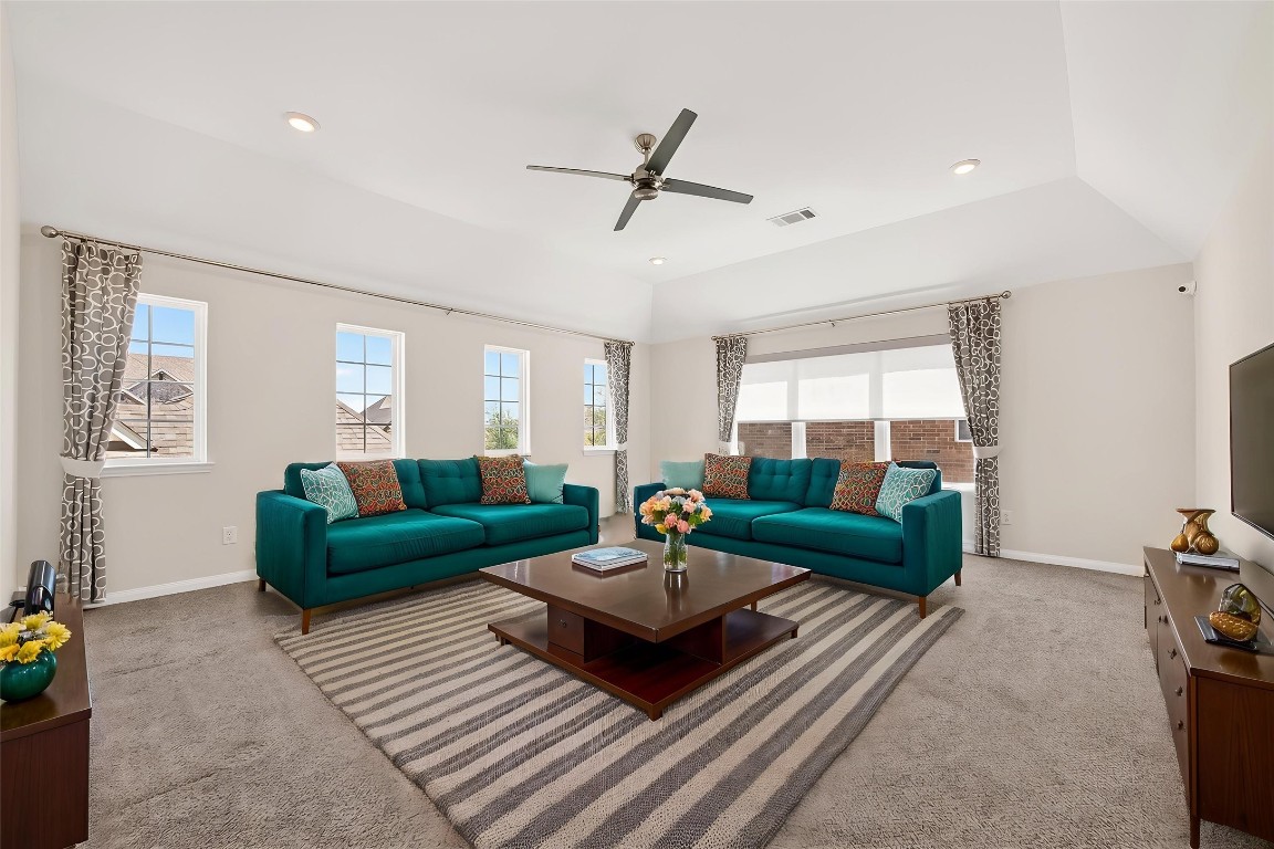 51 Scepter Ridge Sugar Land, TX 77498 - Photo 35 of 46 a living room with furniture and a wooden floor