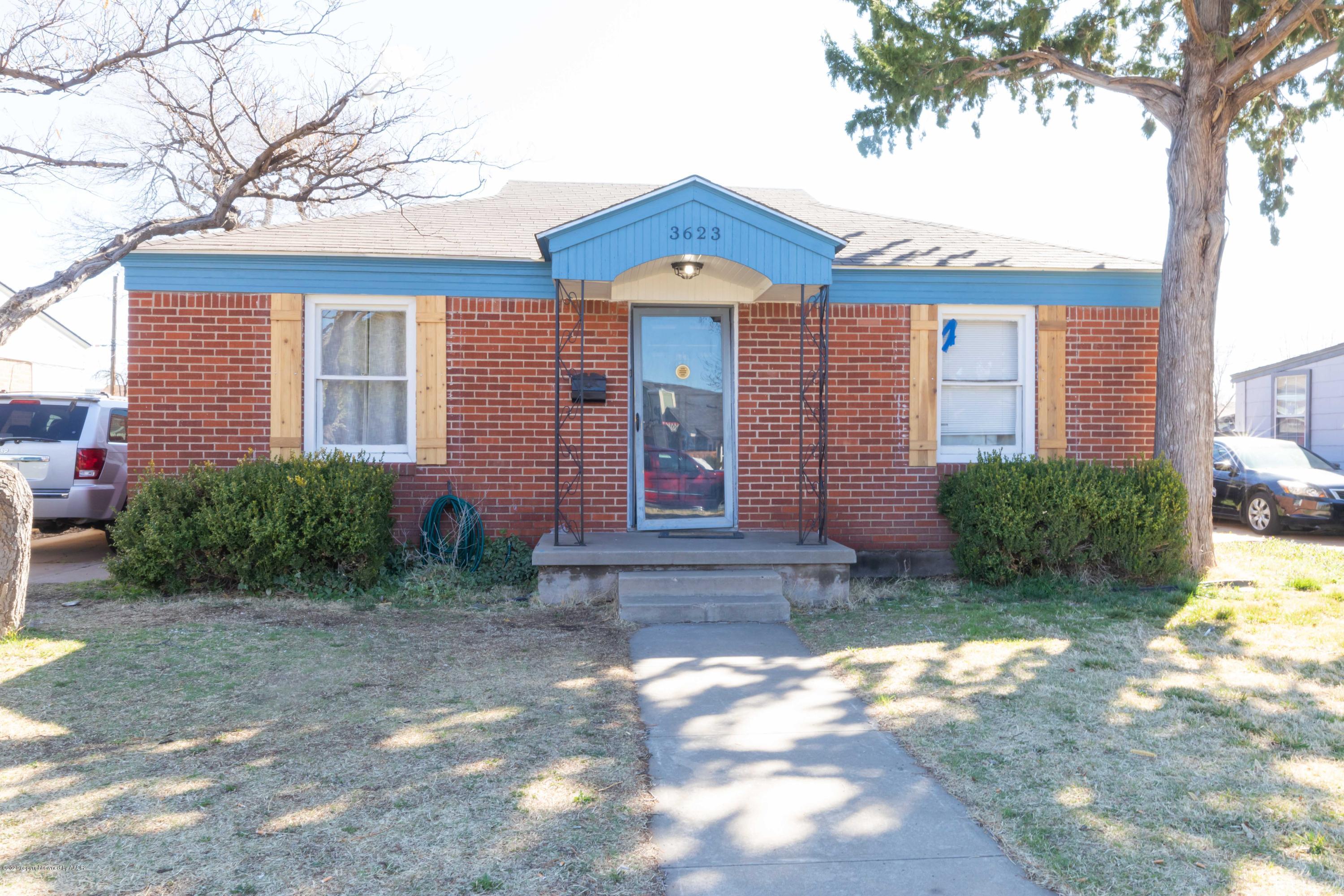 3623 South Hayden Street Amarillo, TX 79110 - Photo 1 of 28 a front view of a house with garden