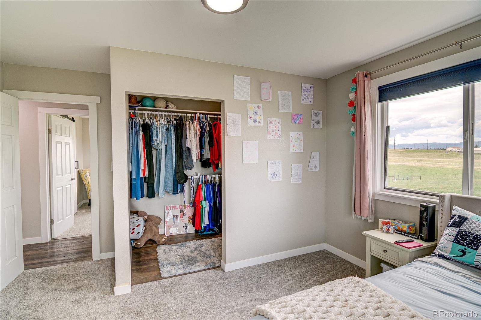 4531 East Best Road Larkspur, CO 80118 - Photo 22 of 49 a view of a livingroom with wooden furniture and a window