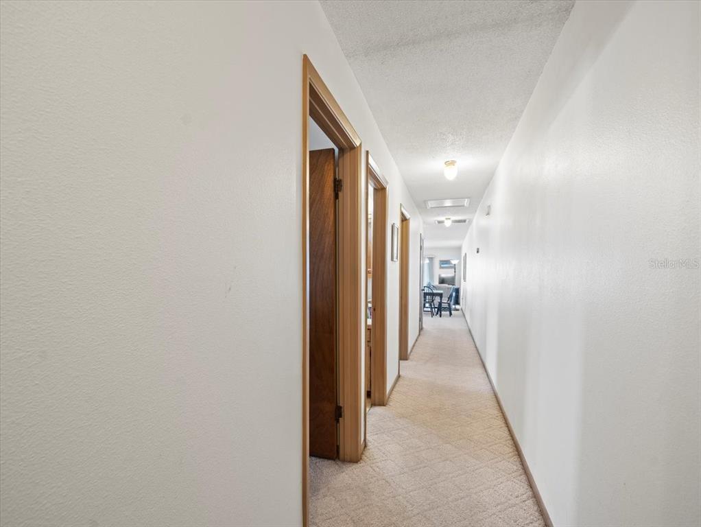 18218 Sunset Boulevard, Unit A St. Petersburg, FL 33708 - Photo 29 of 48 a view of a hallway