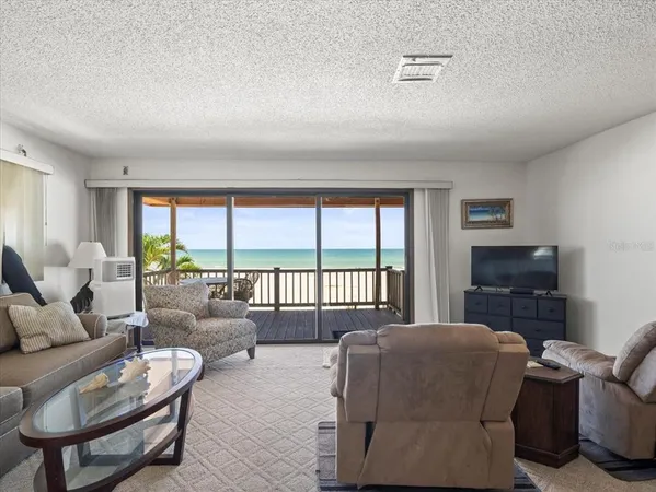 a kitchen with stainless steel appliances granite countertop a stove refrigerator sink and cabinets