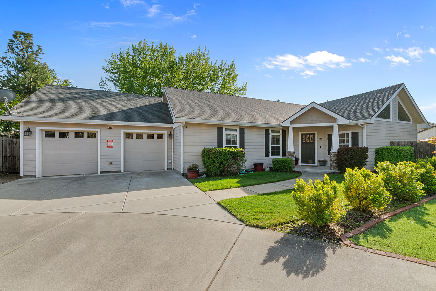 72 Pineridge Lane Eagle Point, OR 97524 - Photo 1 of 34 a house with garden in front of it